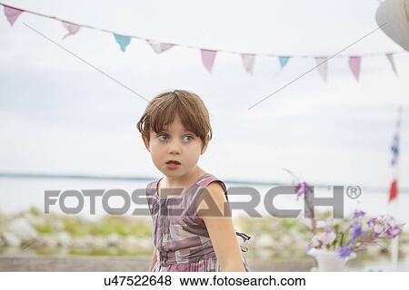 Candid portrait of young girl at party View Large Photo Image Stock Photo - Candid portrait of young girl at party. Fotosearch