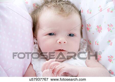 Close up of baby girl View Large Photo Image Stock Photo - Close up of baby girl. Fotosearch