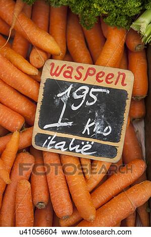 Picture - Close up of market stall carrots, Amsterdam, Netherlands. Fotosearch