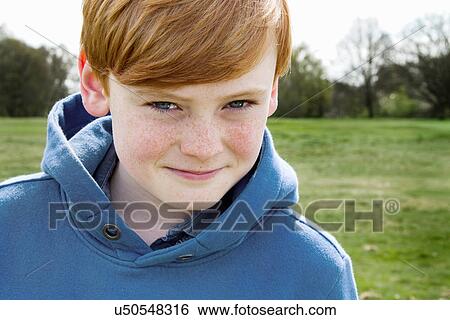 Close up portrait of boy in field View Large Photo Image Stock Photograph - Close up portrait of boy in field. Fotosearch