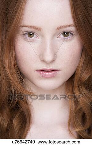 Close up portrait of young woman, looking at camera View Large Photo Image Stock Photo - Close up portrait of young woman, looking at camera. Fotosearch