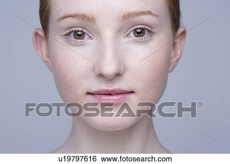 Close up portrait of young woman View Large Photo Image Stock Photograph - Close up portrait of young woman. Fotosearch
