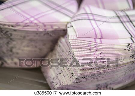 Detail of fabric in clothing factory, close up View Large Photo Image Stock Photo - Detail of fabric in clothing factory, close up. Fotosearch