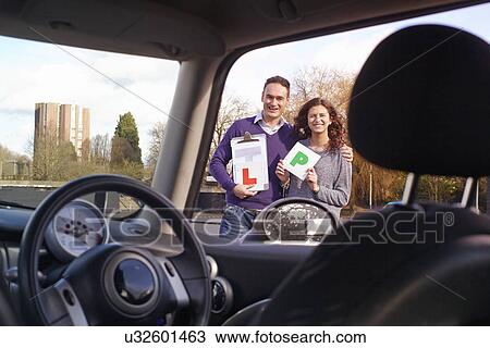 Driving instructor and learner driver holding Learner and Passed plate View Large Photo Image Stock Image - Driving instructor and learner driver holding Learner and Passed plate. Fotosearch