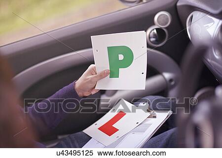 Driving instructor awarding learner driver with Passed Plate View Large Photo Image Stock Photography - Driving instructor awarding learner driver with Passed Plate. Fotosearch