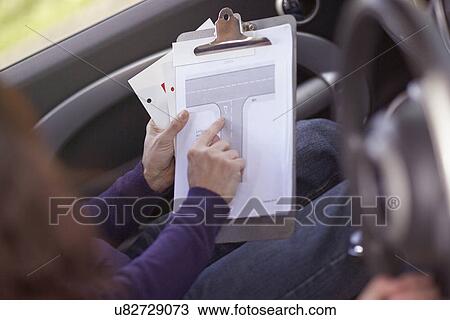 Driving instructor discussing T junction View Large Photo Image Stock Image - Driving instructor discussing T junction. Fotosearch