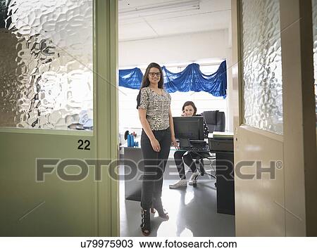 Fashion designers working together in fashion studio View Large Photo Image Stock Image - Fashion designers working together in fashion studio. Fotosearch