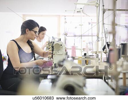 Female garment worker in clothing factory View Large Photo Image Stock Image - Female garment worker in clothing factory. Fotosearch