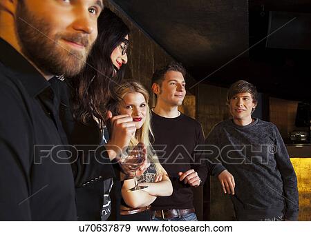 Group of friends in nightclub View Large Photo Image Stock Photo - Group of friends in nightclub. Fotosearch