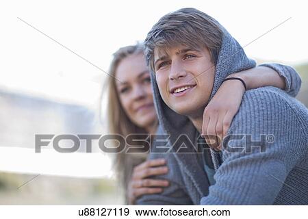 Stock Photo - Happy romantic young couple. Fotosearch