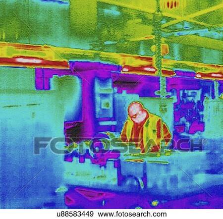 Stock Photo - Infra red heat image of worker and heat loss in factory. Fotosearch