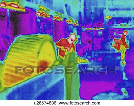 Infra red heat image of workers and heat loss at work station in factory View Large Photo Image Stock Photograph - Infra red heat image of workers and heat loss at work station in factory. Fotosearch