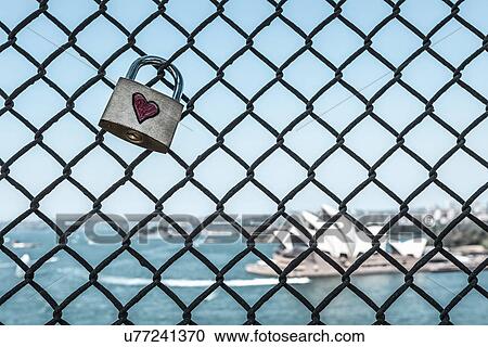 Stock Image - Love padlock on Sydney harbour Bridge, Sydney, New South Wales, Australia. Fotosearch