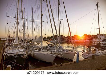 Marina yachts at sunset, Vollendam, Netherlands View Large Photo Image Stock Photography - Marina yachts at sunset, Vollendam, Netherlands. Fotosearch