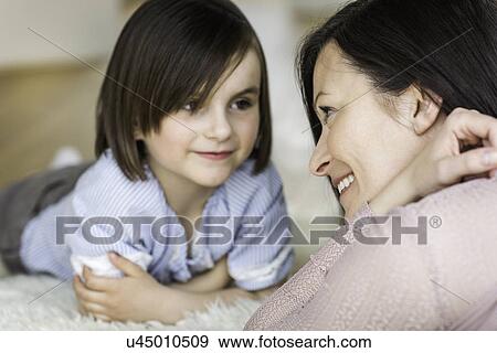 Mother and daughter face to face View Large Photo Image Stock Photo - Mother and daughter face to face. Fotosearch