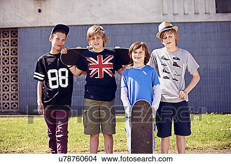 Picture - Portrait of boys with skateboards. Fotosearch
