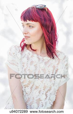 Portrait of feminine young woman with pink hair View Large Photo Image Stock Photo - Portrait of feminine young woman with pink hair. Fotosearch