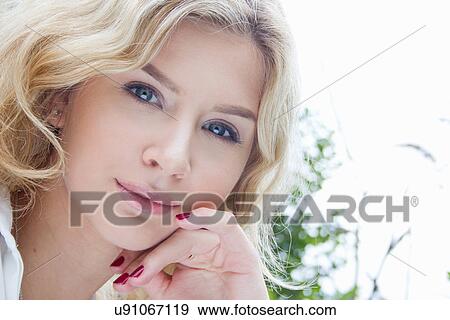 Stock Photo - Portrait of teenage girl, close-up. Fotosearch