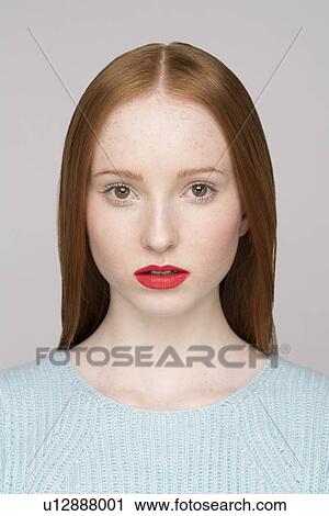 Stock Image - Portrait of young woman. Fotosearch