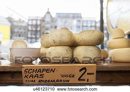 Round cheeses in shop window, Amsterdam, Netherlands View Large Photo Image Stock Image - Round cheeses in shop window, Amsterdam, Netherlands. Fotosearch