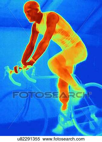 Stock Photography - Side view thermal image of young male athlete in training, showing the heat of the muscles and of the bicycle tires. Fotosearch