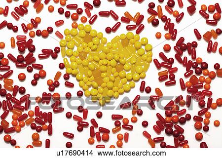 Still life of heart shaped by yellow candy View Large Photo Image Picture - Still life of heart shaped by yellow candy. Fotosearch