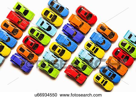 Still life with rows of toy cars View Large Photo Image Stock Image - Still life with rows of toy cars. Fotosearch