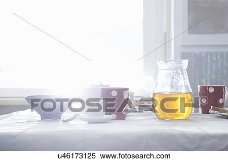 Stock Photography - Table set for breakfast. Fotosearch