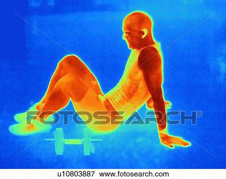 Stock Photo - Thermal image of young male athlete taking a break from training. The image shows the heat produced by the muscles. Fotosearch