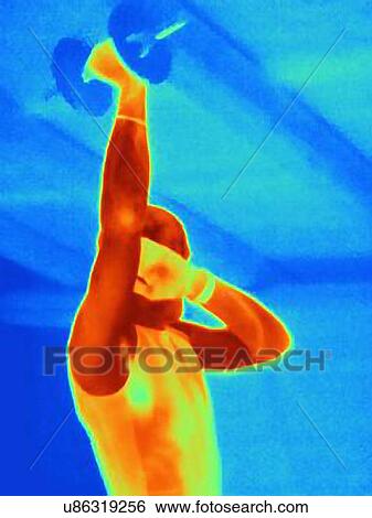 Thermal image of young male athlete training with barbell. The image shows the heat produced by the muscles View Large Photo Image Stock Photograph - Thermal image of young male athlete training with barbell. The image shows the heat produced by the muscles. Fotosearch