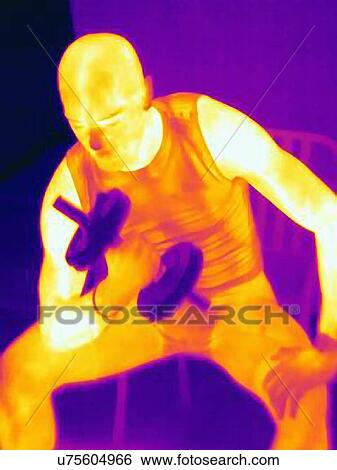 Thermal image of young male training with barbell. The image shows the heat produced by the muscles View Large Photo Image Stock Photograph - Thermal image of young male training with barbell. The image shows the heat produced by the muscles. Fotosearch