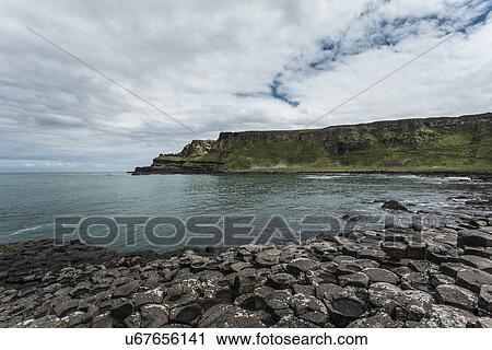 View of Giants Causeway, Bushmills, County Antrim, Northern Ireland, UK View Large Photo Image Stock Image - View of Giants Causeway, Bushmills, County Antrim, Northern Ireland, UK. Fotosearch