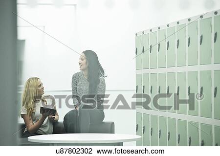 Young women with digital tablet View Large Photo Image Stock Image - Young women with digital tablet. Fotosearch