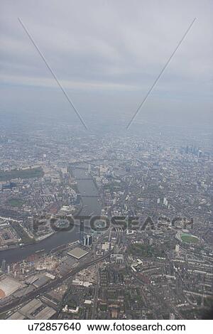 Aerial view of city and River Thames, London, UK View Large Photo Image Stock Image - Aerial view of city and River Thames, London, UK. Fotosearch