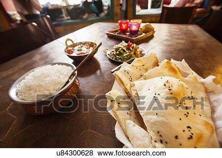 Close-up of fresh food served at table in restaurant View Large Photo Image Stock Photo - Close-up of fresh food served at table in restaurant. Fotosearch