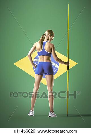 Full length rear view of javelin thrower standing over Brazilian flag View Large Photo Image Stock Photograph - Full length rear view of javelin thrower standing over Brazilian flag. Fotosearch