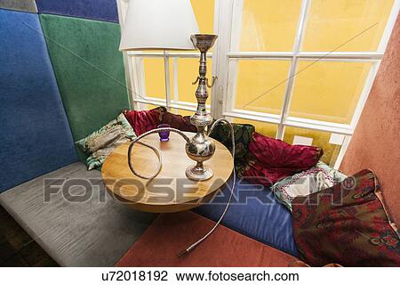 Stock Image - Hookah on table in restaurant. Fotosearch