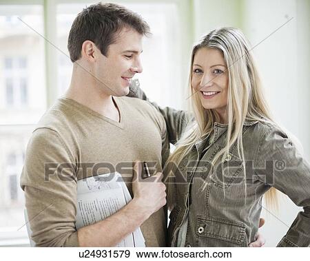 Loving business couple in office View Large Photo Image Stock Photo - Loving business couple in office. Fotosearch