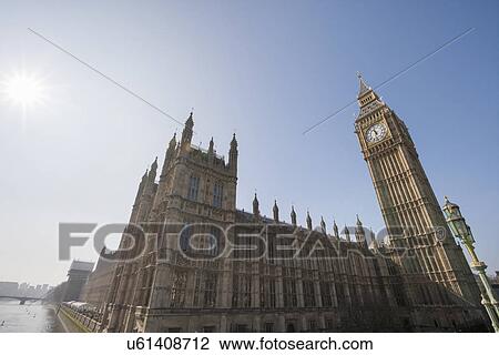 Stock Image - Low angle view of Big Ben and parliament building against clear sky at London, England, UK. Fotosearch