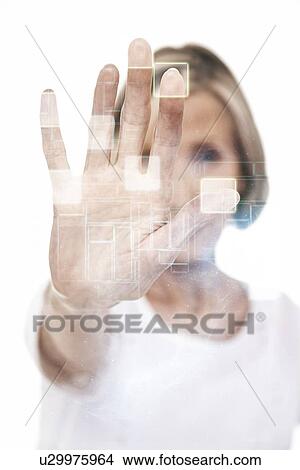 Senior businesswoman touching visual screen over white background View Large Photo Image Picture - Senior businesswoman touching visual screen over white background. Fotosearch