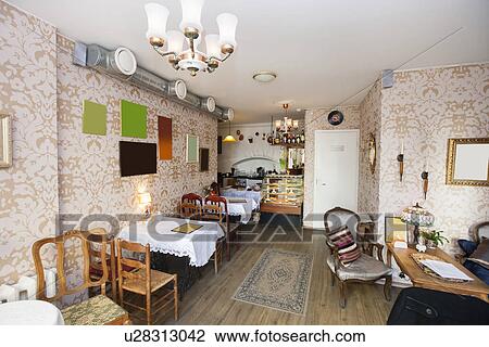 Tables and chairs in empty restaurant View Large Photo Image Stock Image - Tables and chairs in empty restaurant. Fotosearch