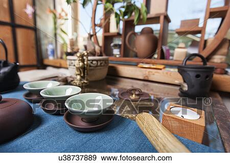 Stock Photo - Teacups in tea store. Fotosearch