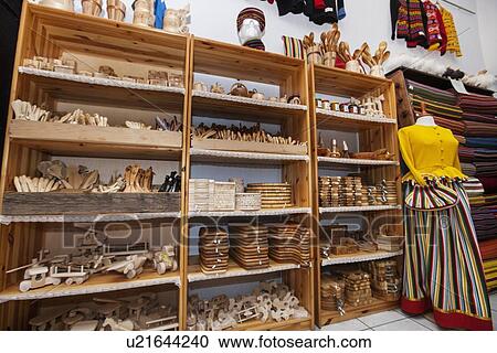 Wooden handicrafts displayed on shelves in gift store View Large Photo Image Stock Image - Wooden handicrafts displayed on shelves in gift store. Fotosearch