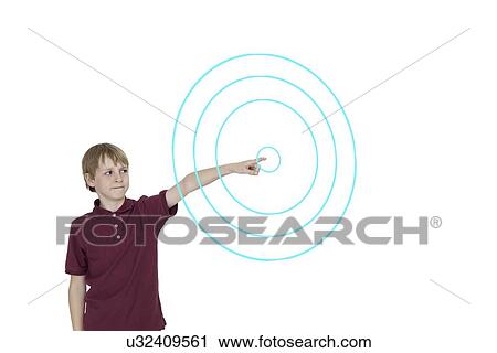 Young boy pointing to digitally designed concentric circles over white background View Large Photo Image Stock Image - Young boy pointing to digitally designed concentric circles over white background. Fotosearch