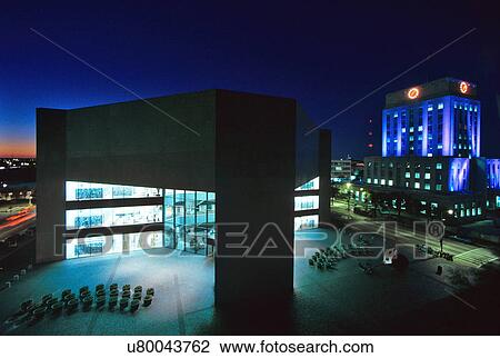 Stock Image - aerial night view of the houston public library and city hall in downtown houston texas. Fotosearch