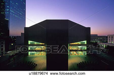 an evening view of the downtown Houston public library View Large Photo Image Picture - an evening view of the downtown Houston public library. Fotosearch