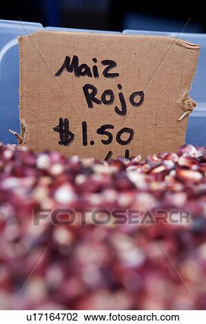 Stock Image - stock photo of a bucket of red corn at the Houston Farmers Market. Fotosearch