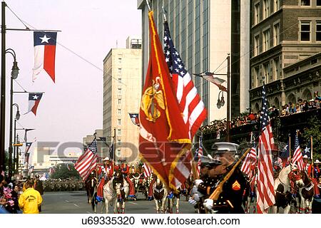 Stock photo of a holiday parade traveling through downtown Houston Texas View Large Photo Image Stock Image - Stock photo of a holiday parade traveling through downtown Houston Texas. Fotosearch
