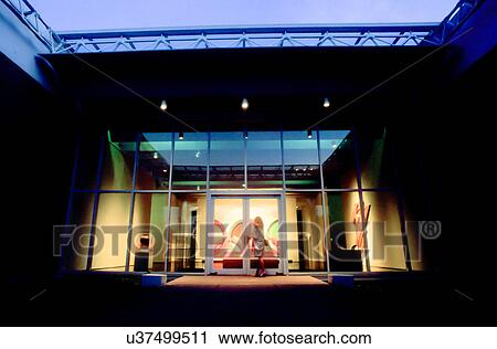 Stock Image - Stock photo of a woman at the entrance of the Menil Collection in Houston Texas. Fotosearch