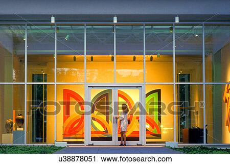 Stock Image - Stock photo of a woman entering the Menil Collection in Houston Texas. Fotosearch